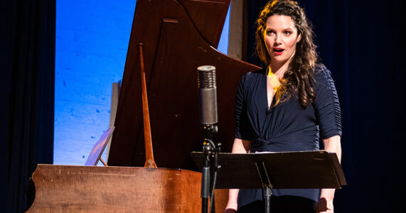 Photo of Mireille Asselin by Dahlia Katz Mireille Asselin singing at a music stand